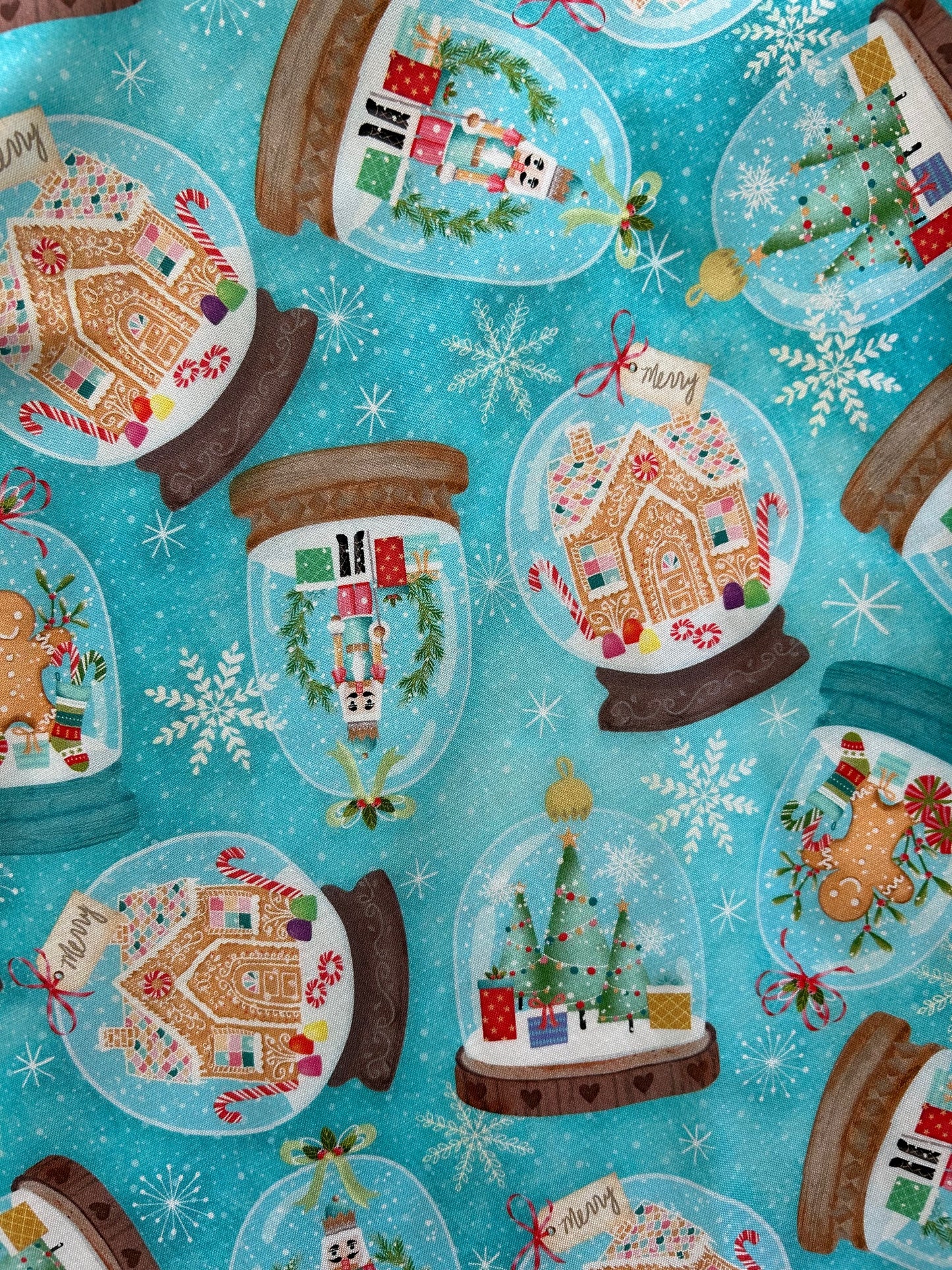 close up of the snow globes on blue background