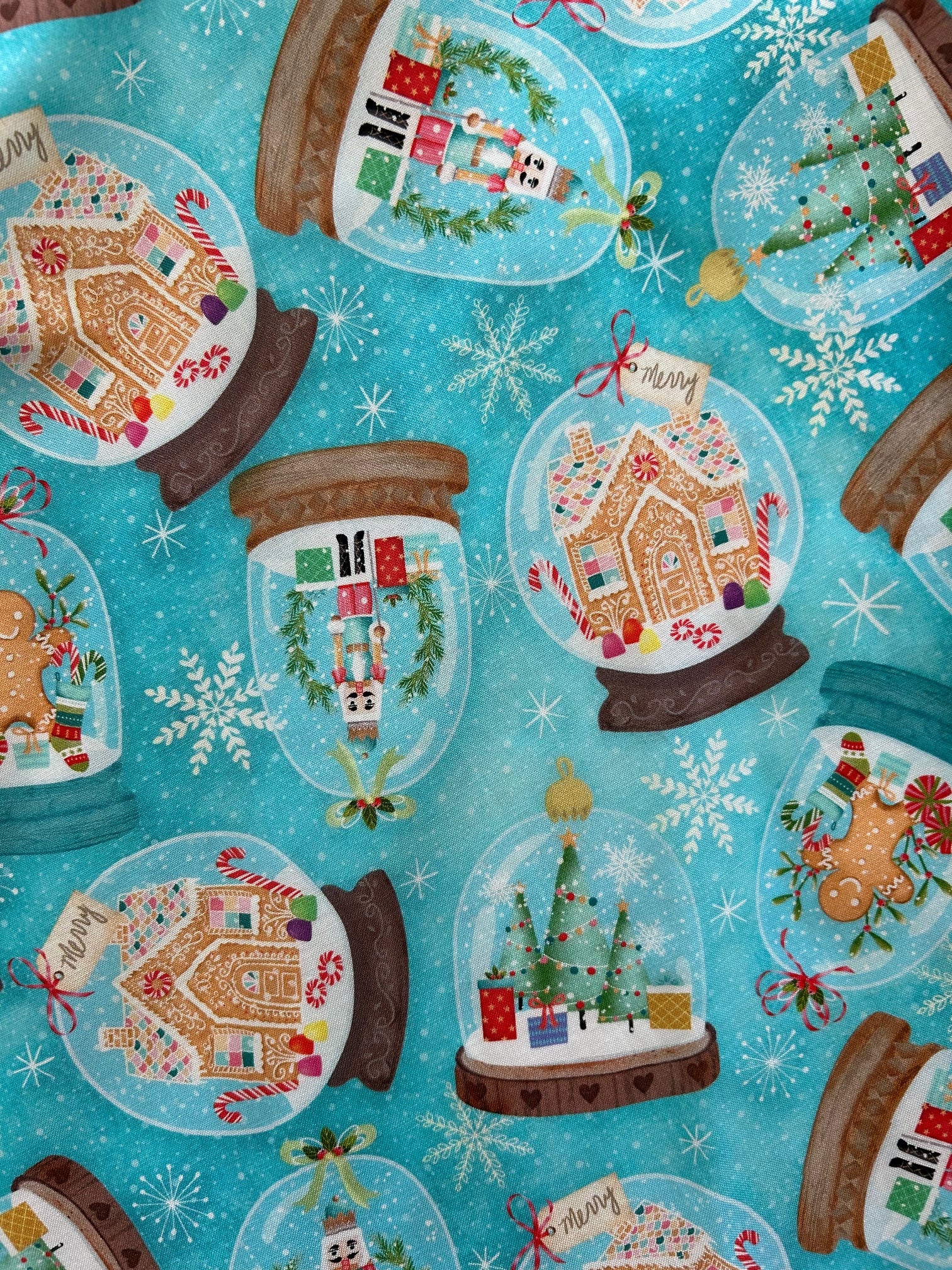 close up of the snow globes on blue background