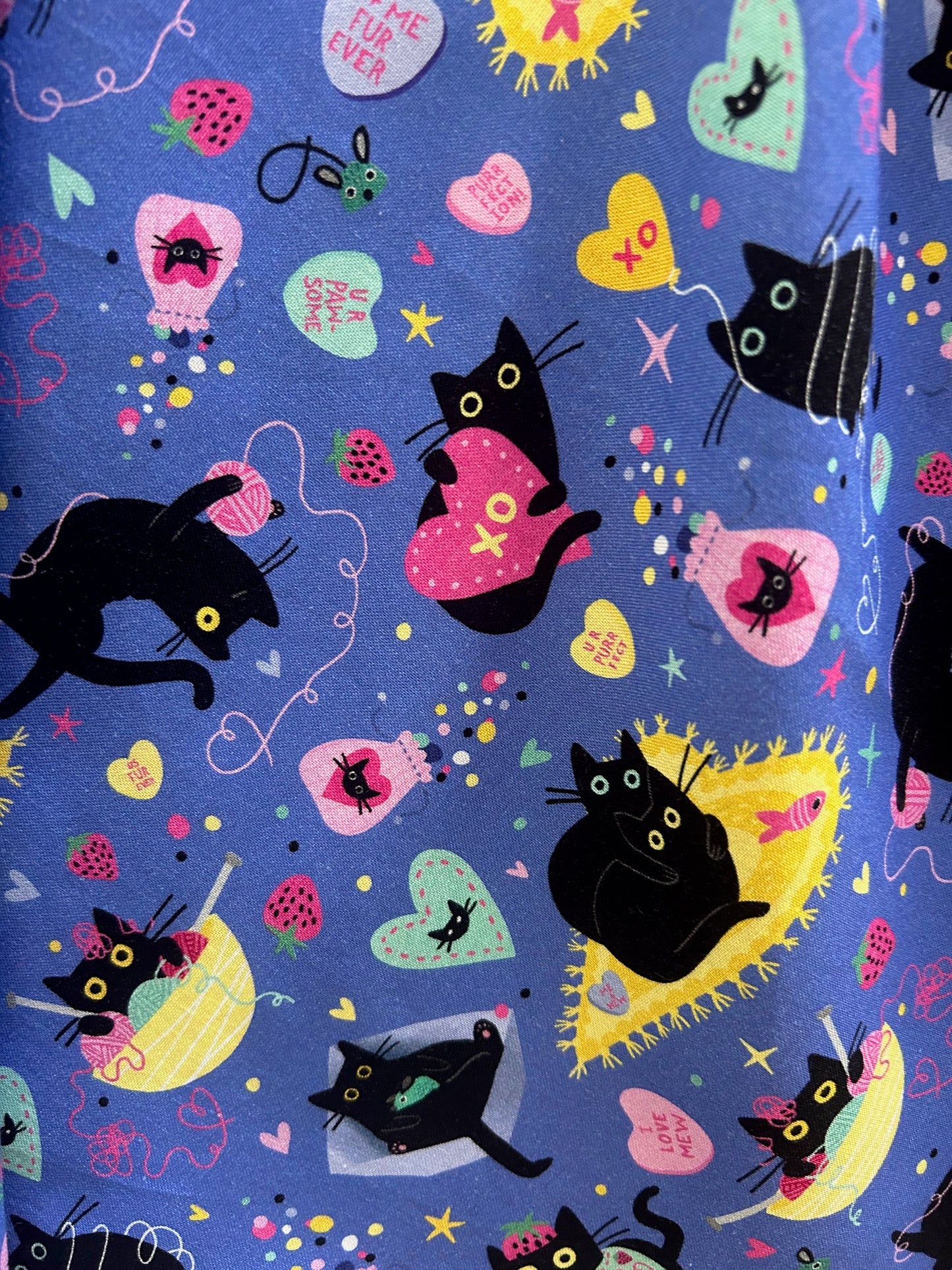 close up of purple cat doris print