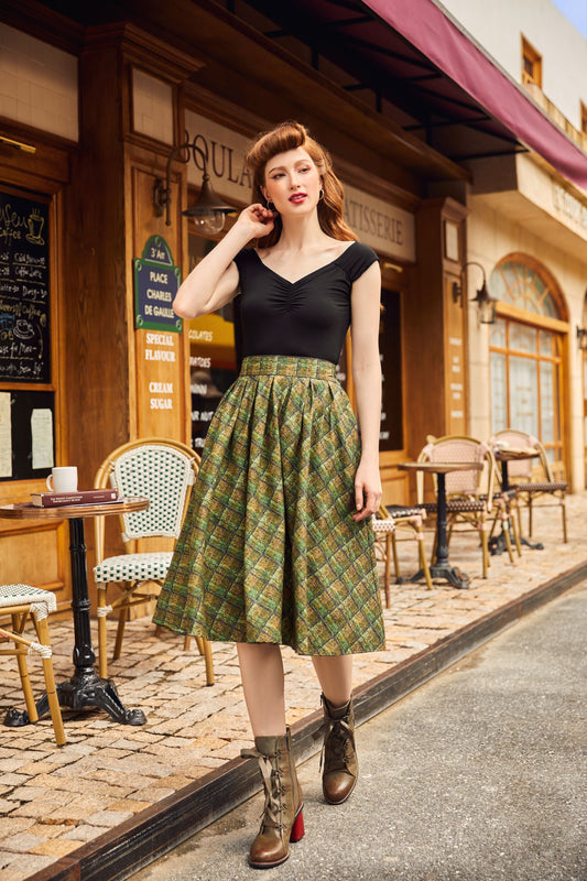 full body image of model wearing green plaid doris skirt