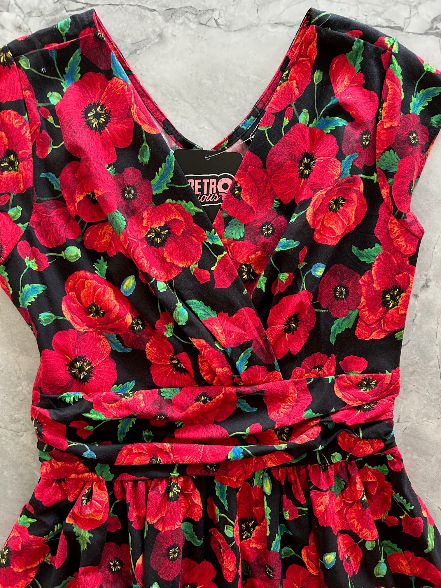 flatlay of bodice of floral poppy greta dress