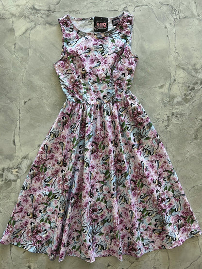 flatlay of birds midi dress