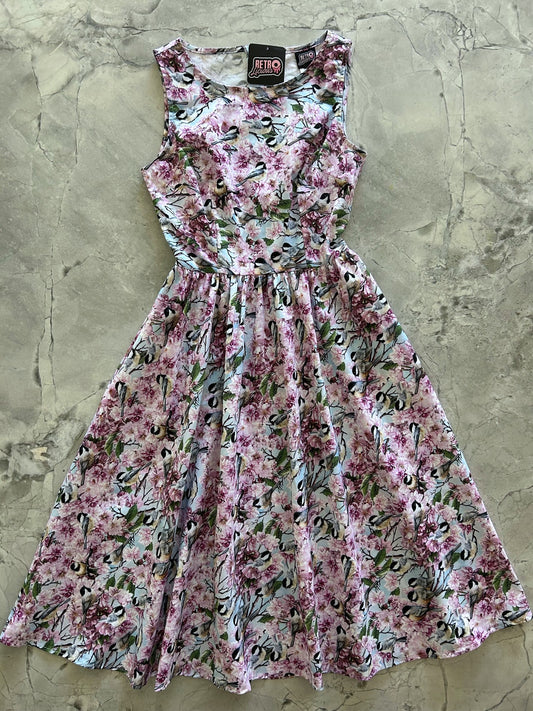 flatlay of birds midi dress