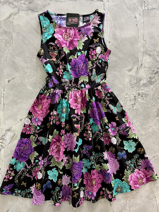 flatlay of butterfly floral vintage dress