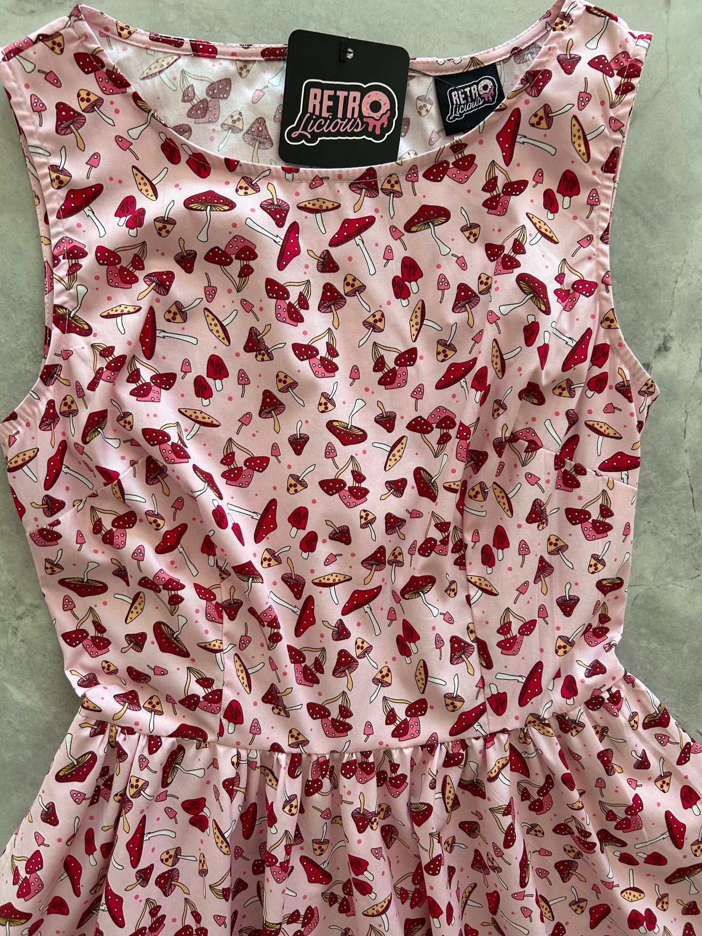 close up of toadstool vintage dress 