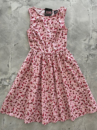 flatlay of toadstool vintage dress