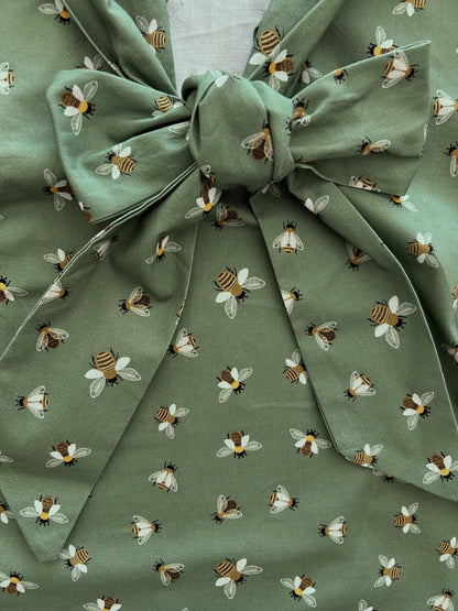 close up of bee bow top