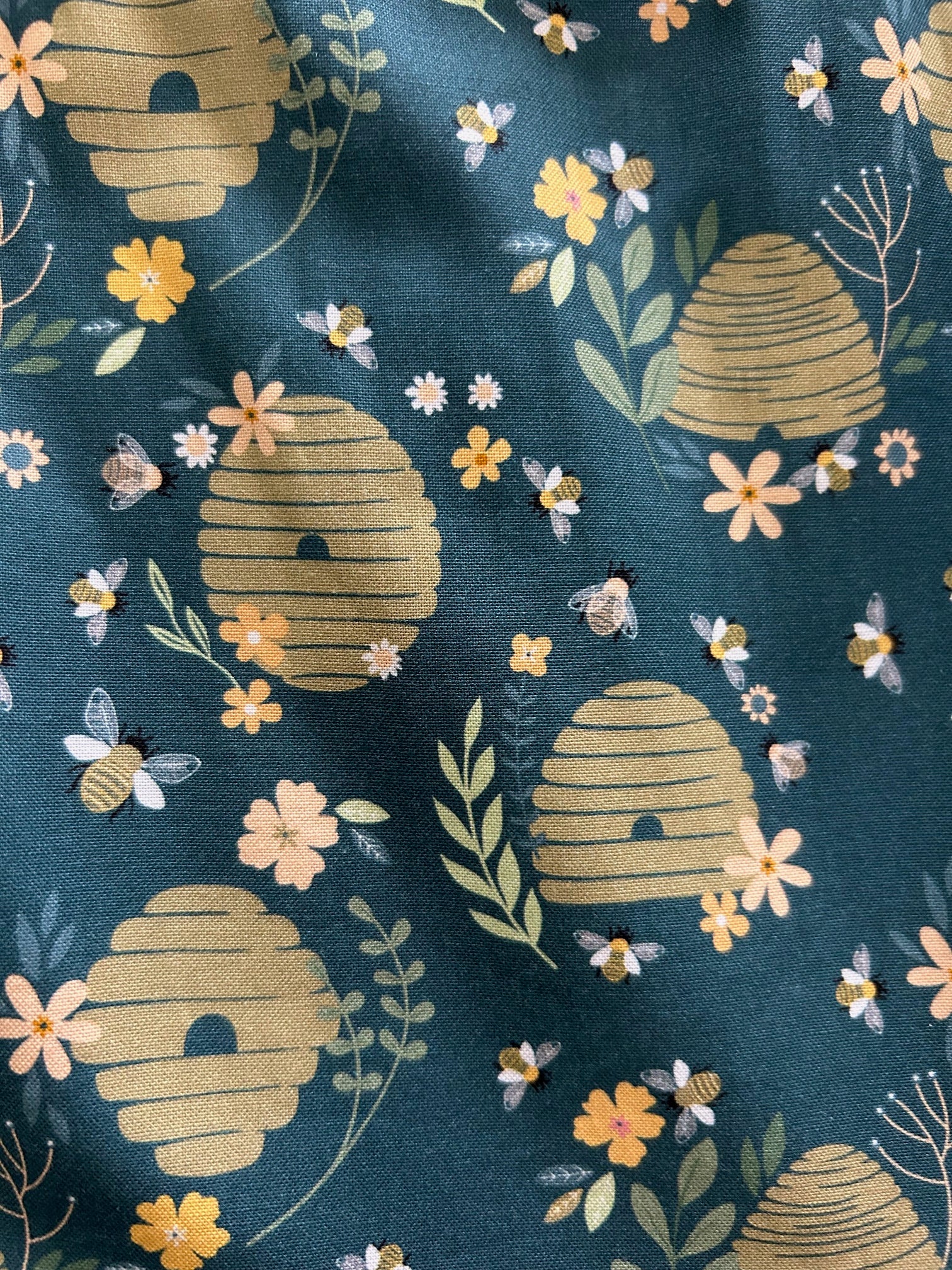 clolse up of beehive printn on green background