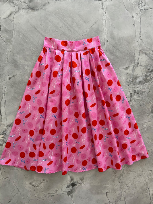 flatlay of our paris doris skirt showing the inverted pleats