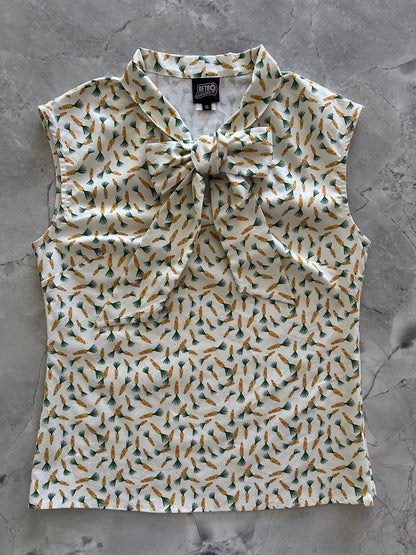flatlay of carrots bow top