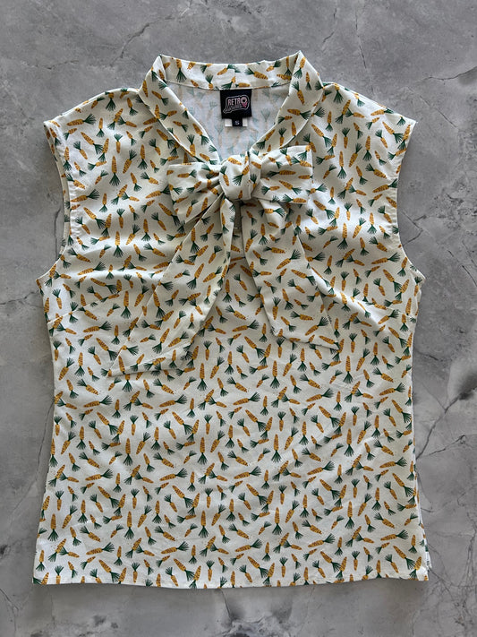 flatlay of carrots bow top