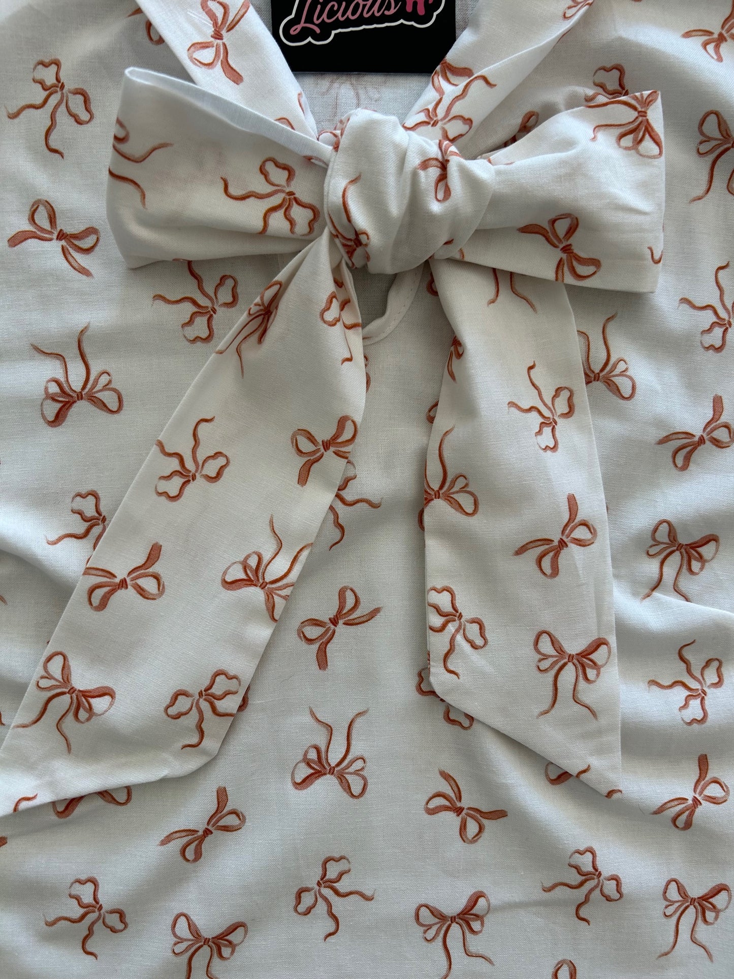 close up of pink bows bow top