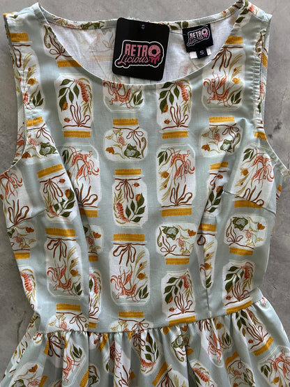 flatlay of bodice of jars vintage dress