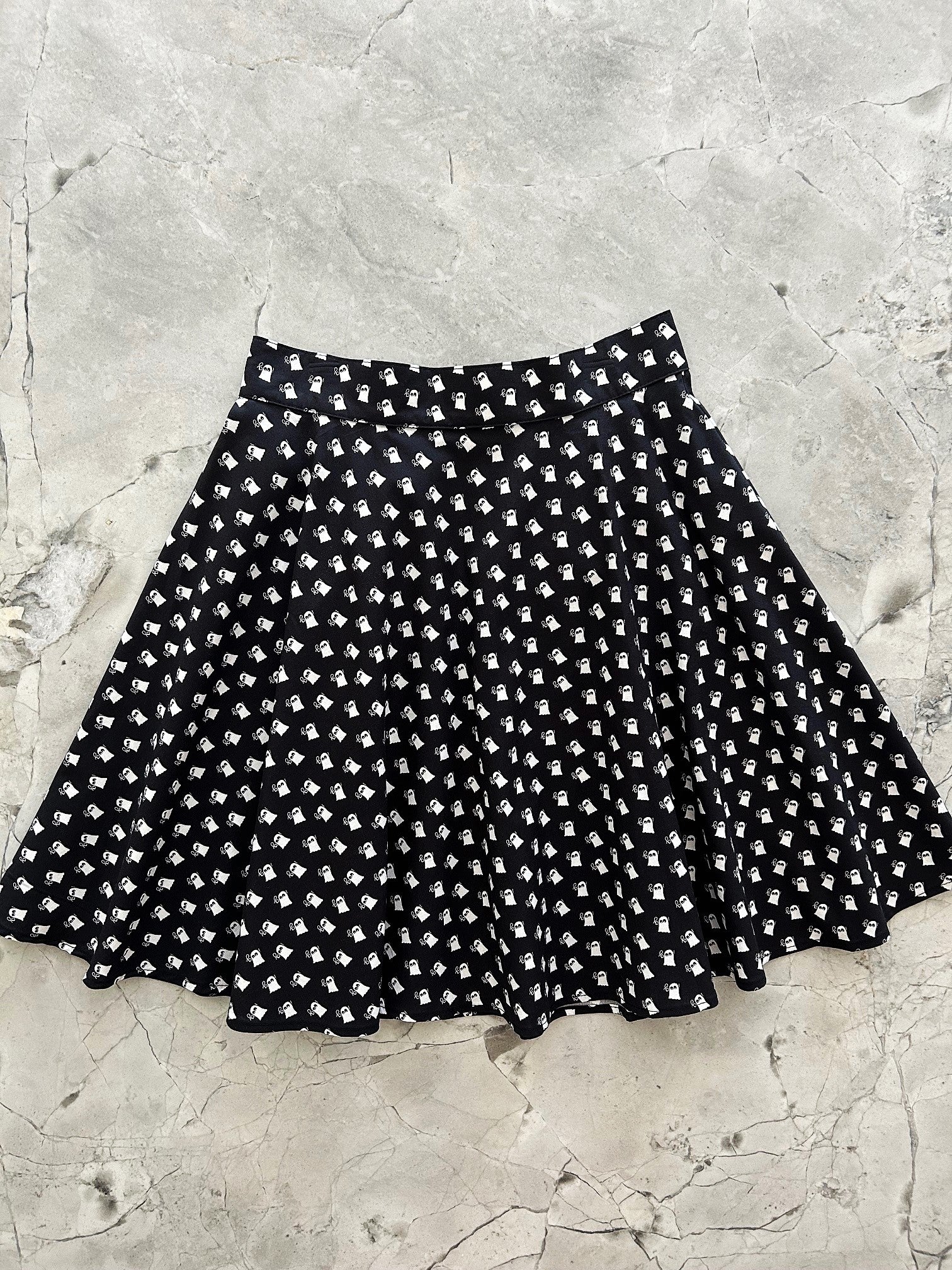 flatlay of mini ghosts skater skirt