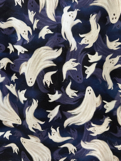 close up of flying ghosts on blue background