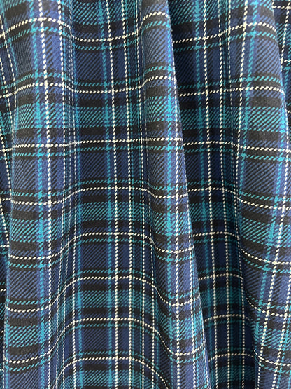close up of the plaid fabric showing the blue plaid pattern