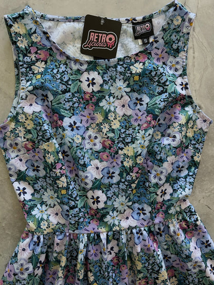 flatlay of front bodice of painted floral vintage dress
