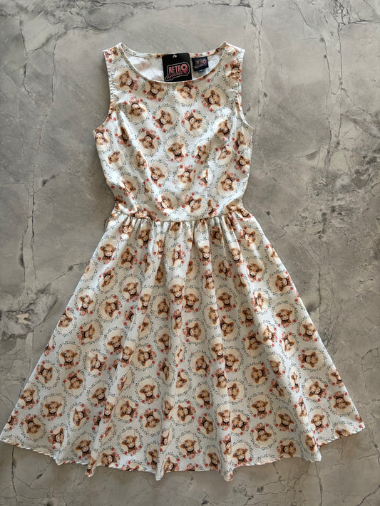 Floral-patterned dress on a textured surface