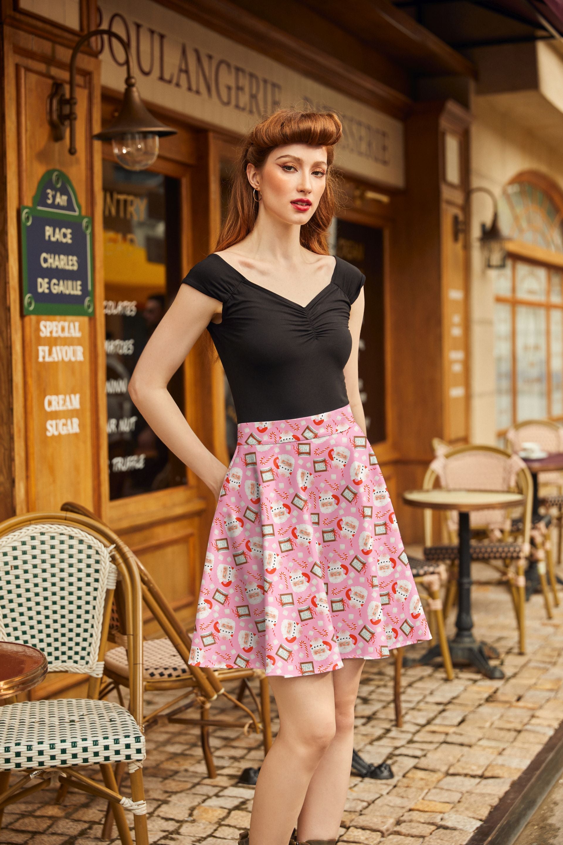 model wearing santa mugs skater skirt with black isabel top