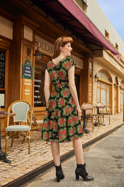 back view of model wearing poinsetiia greta dress 