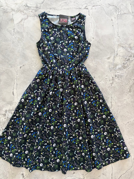 Floral patterned dress on a textured surface