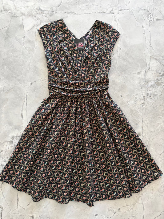moth patterned great dress on a flatlay