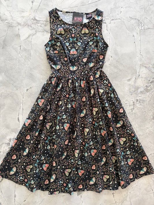 Floral-patterned dress on a textured surface