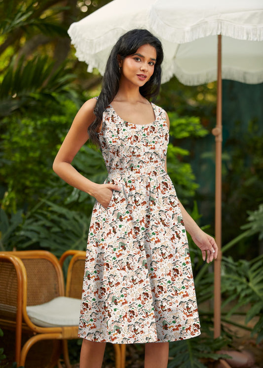 woman wearing a Patterned fabric with animal illustrations on a white background