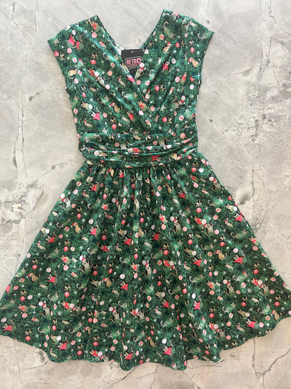 flatlay of our holiday cats greta dress