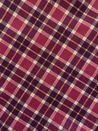 close up of the burgundy and gold plaid