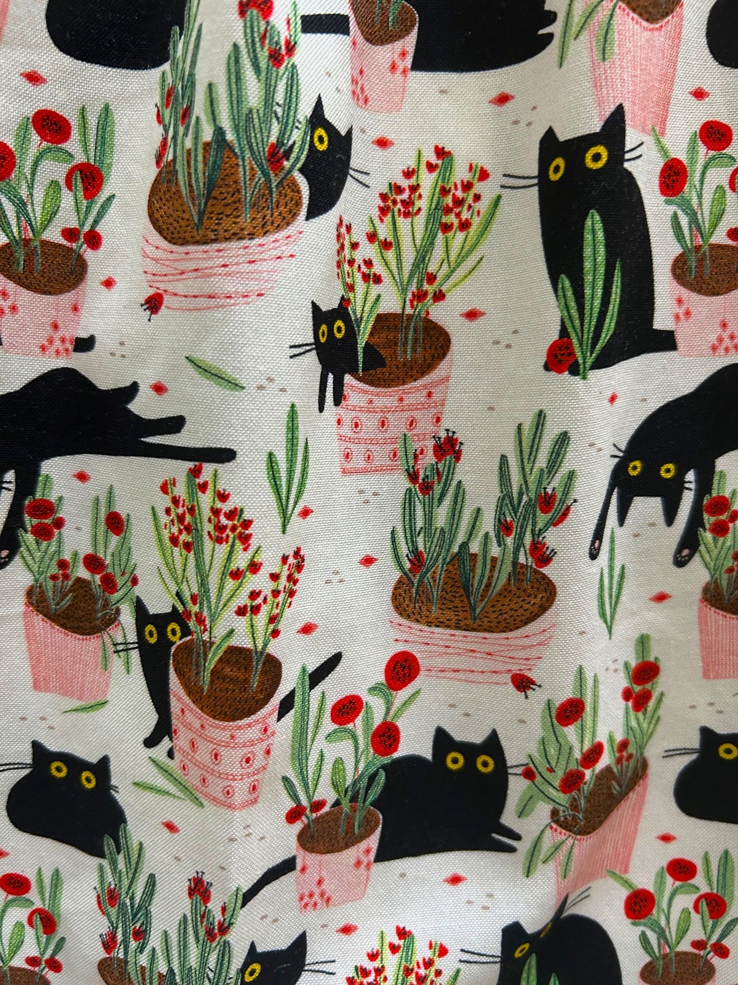 close up of the cats and plants print