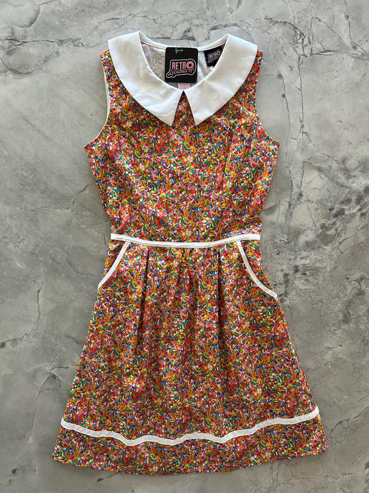 flatlay of sprinkles collared dress