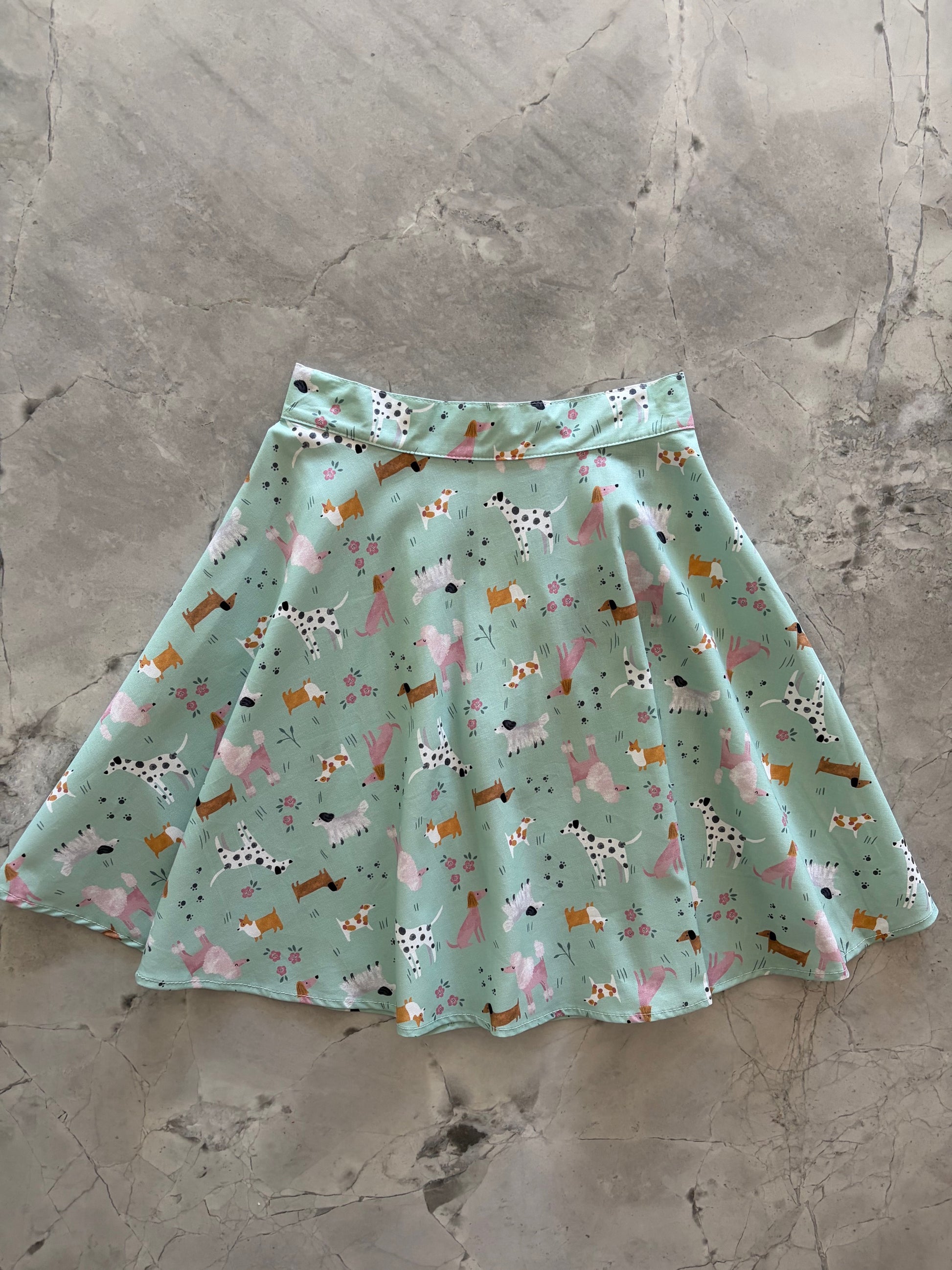 skater skirt with dog pattern on a textured surface