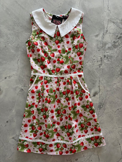 flatlay of strawberry collare dress