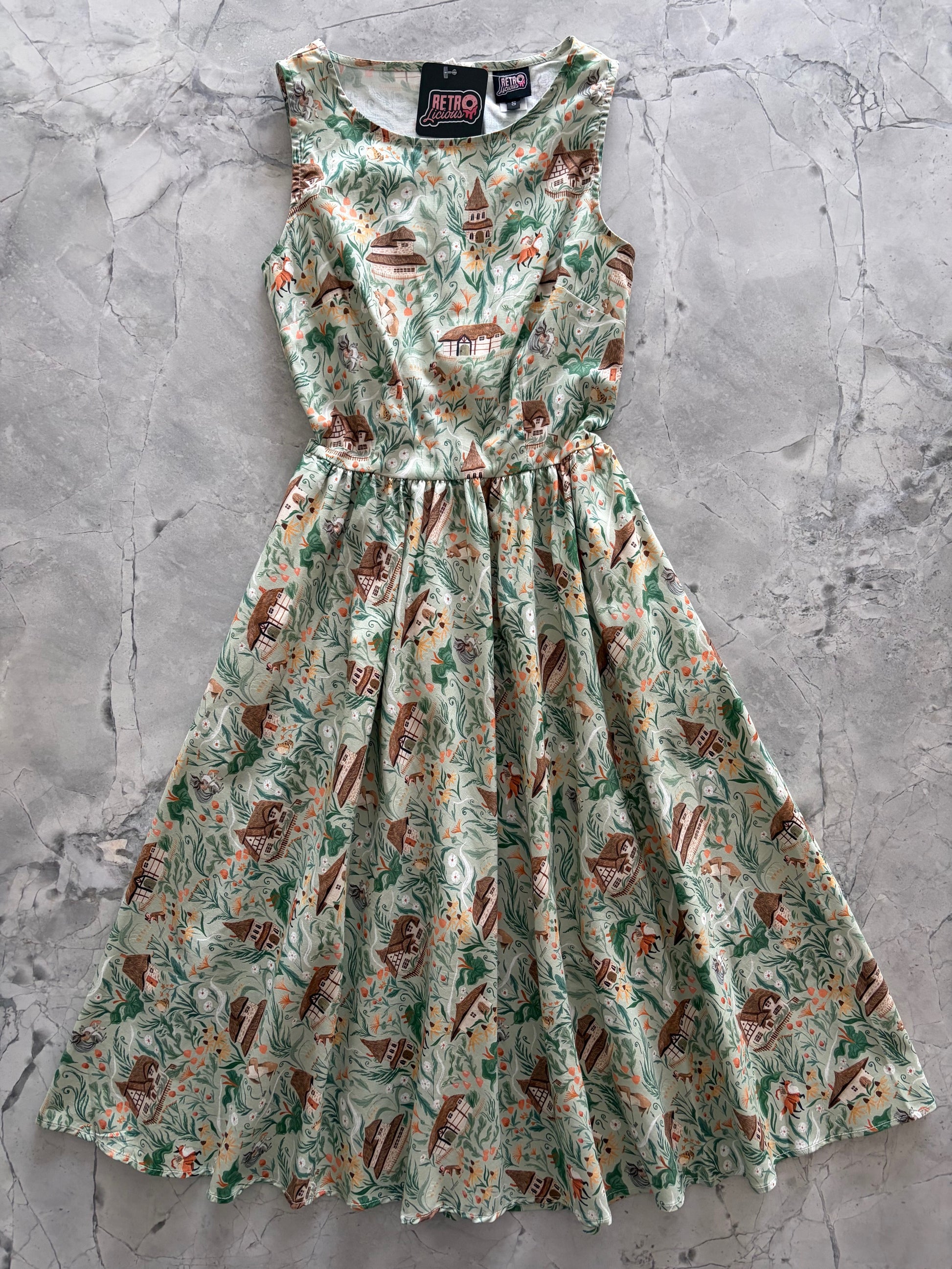 Floral dress on a textured gray surface