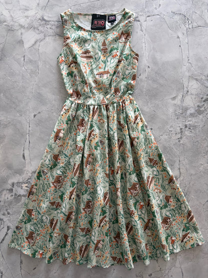 Floral dress on a textured gray surface