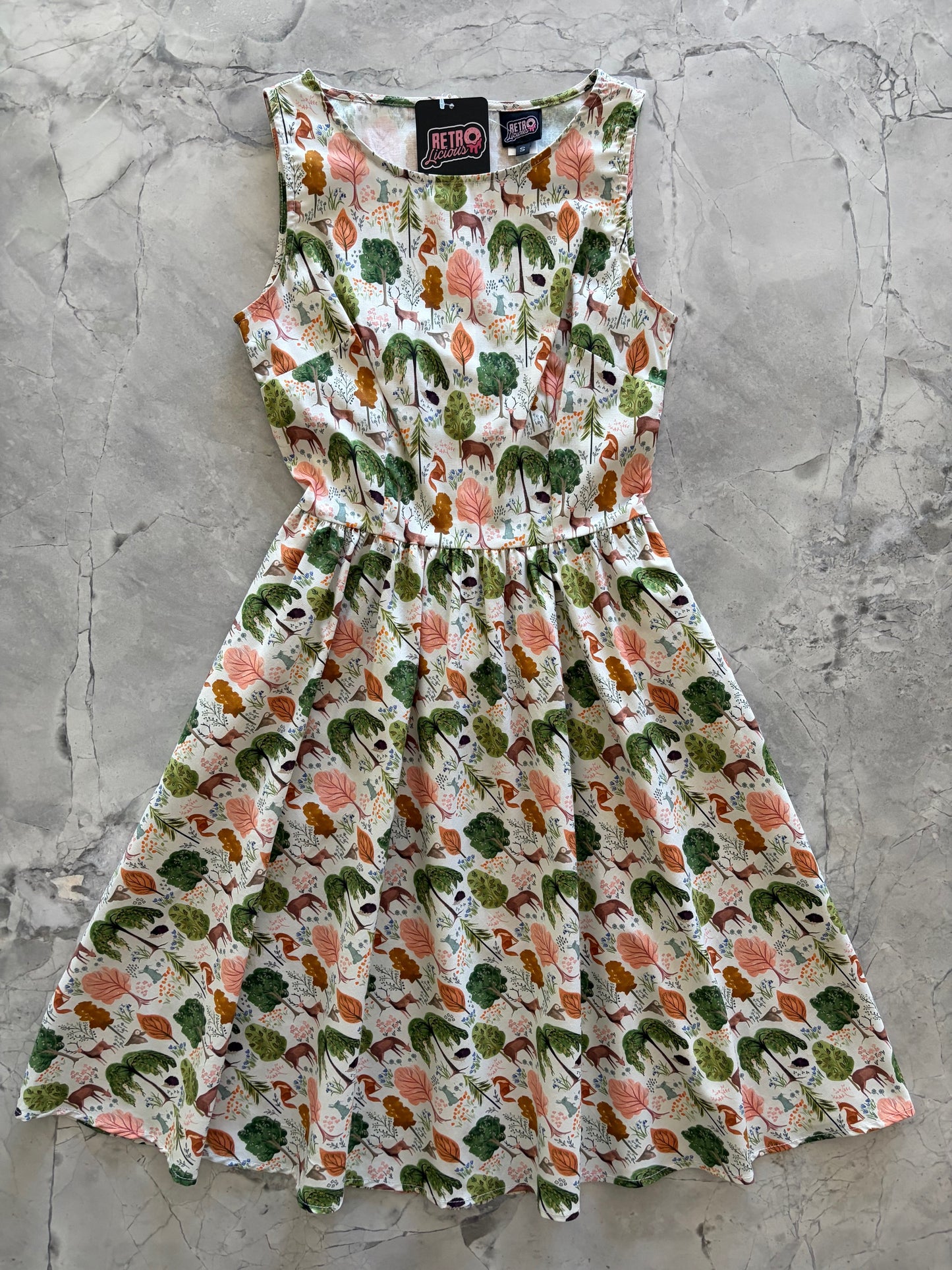 animal-patterned dress on a gray surface