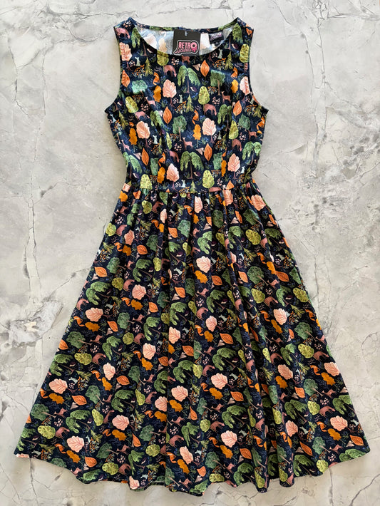 Floral patterned dress on a textured gray surface