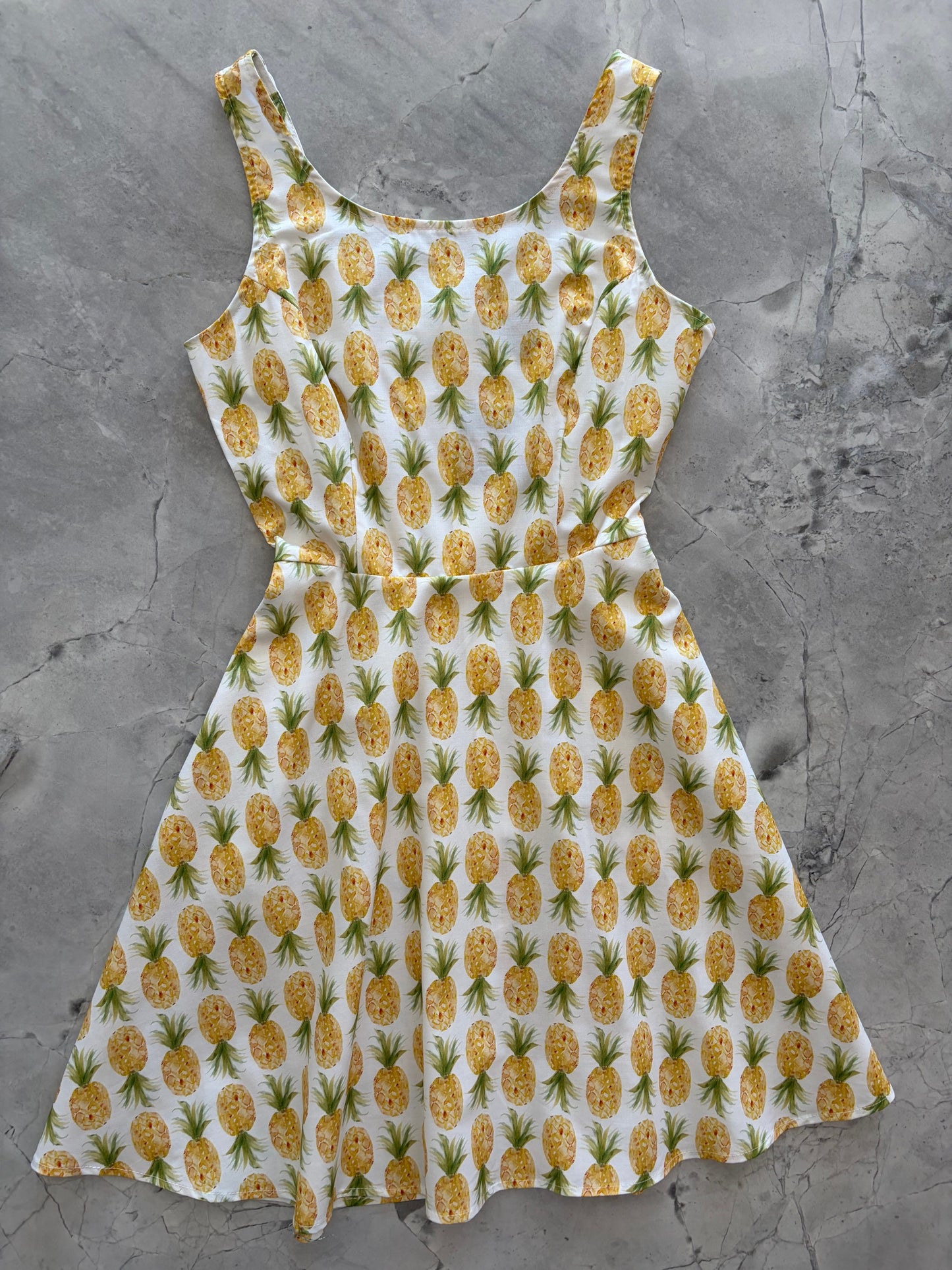 flatlay pineapple print dress 