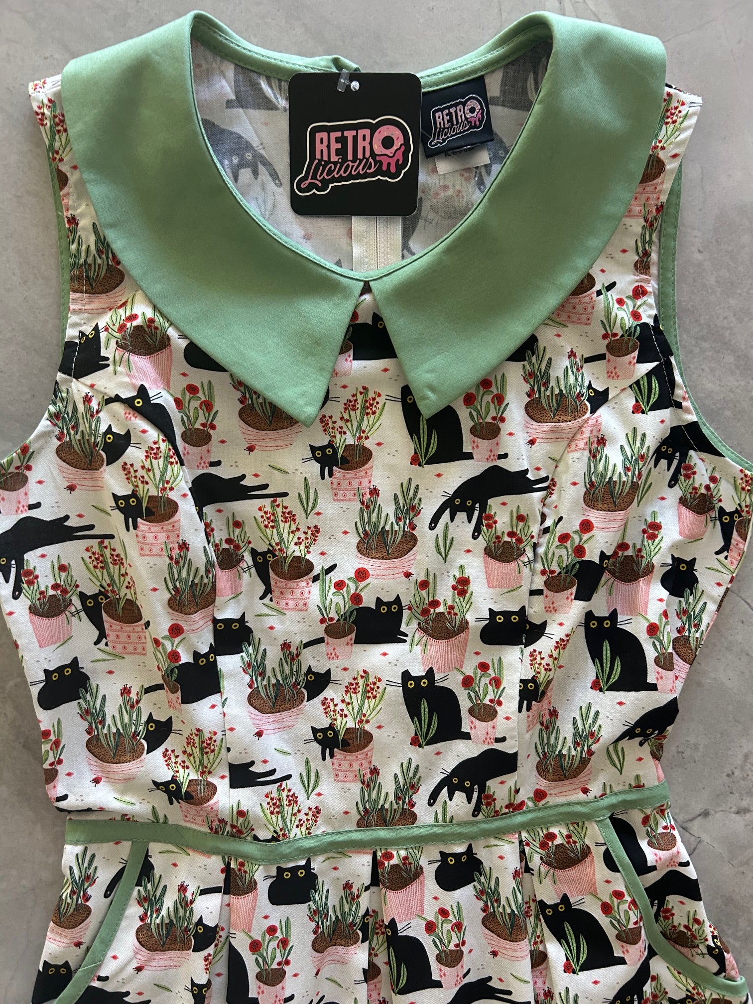 close up of the bodice of cats and plants dress