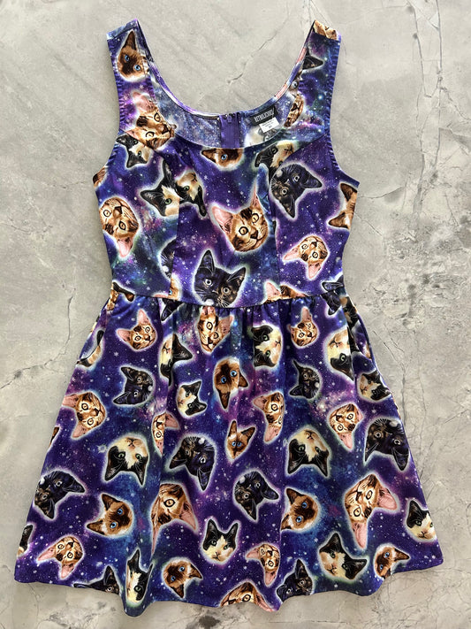 flatlay of galaxy cat dress