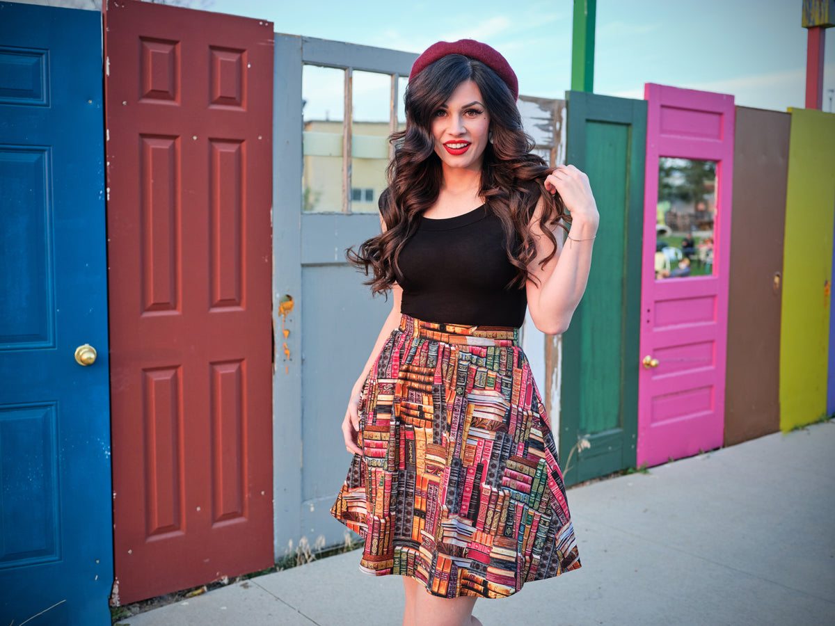 a full size image of a model wearing our Don't Judge a Book by its Cover Skirt