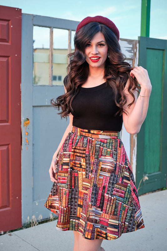 a full size image of a model wearing our Don't Judge a Book by its Cover Skirt