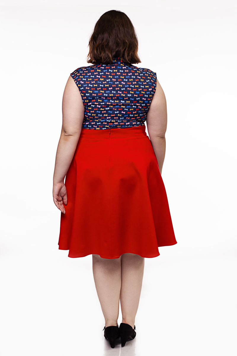 a back view of plus size model wearing the charlotte skirt in red