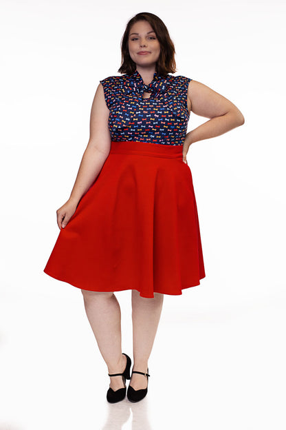 a model wearing the charlotte skirt in red