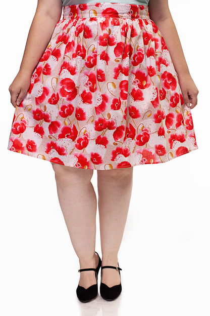 close up of our pink floral skirt on a plus size model