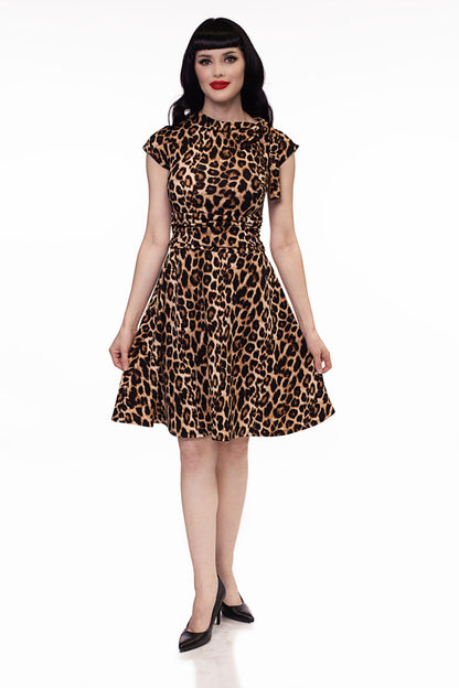 a full size image of a model wearing our Leopard Bombshell dress