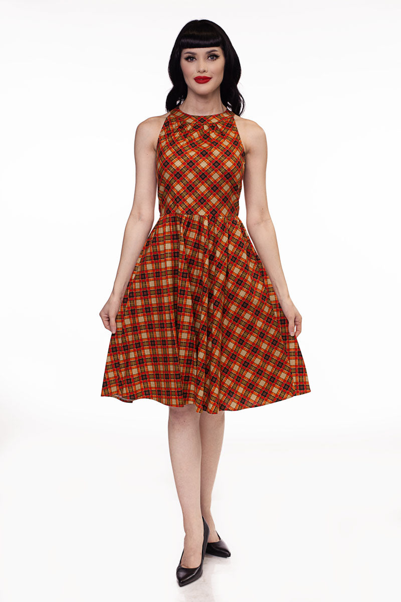 a model wearing our Plaid High Neck dress