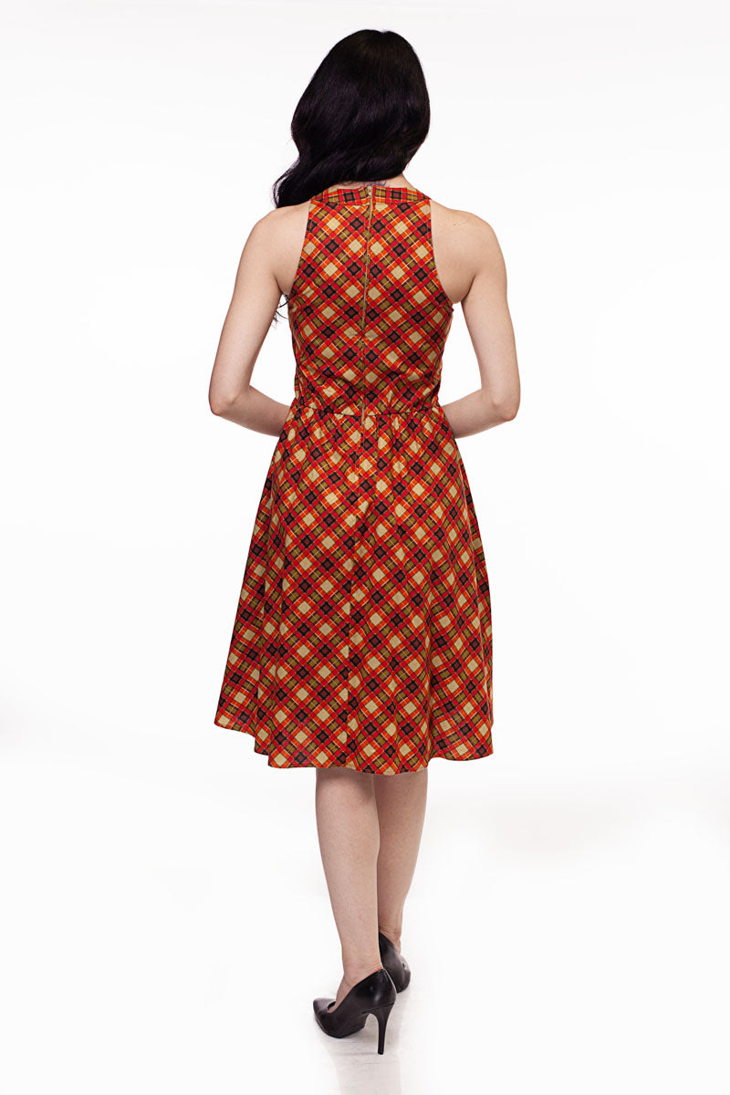 a back side of a model wearing our Plaid High Neck dress