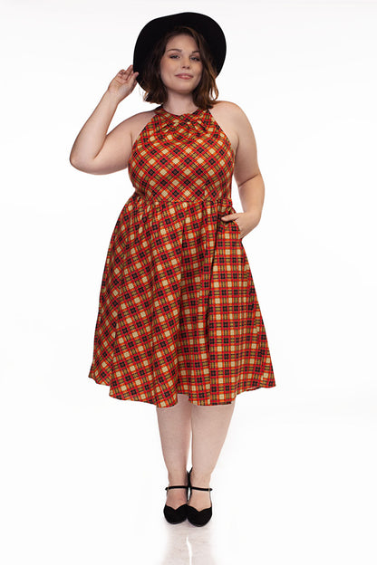 a plus size model wearing our Plaid High Neck dress